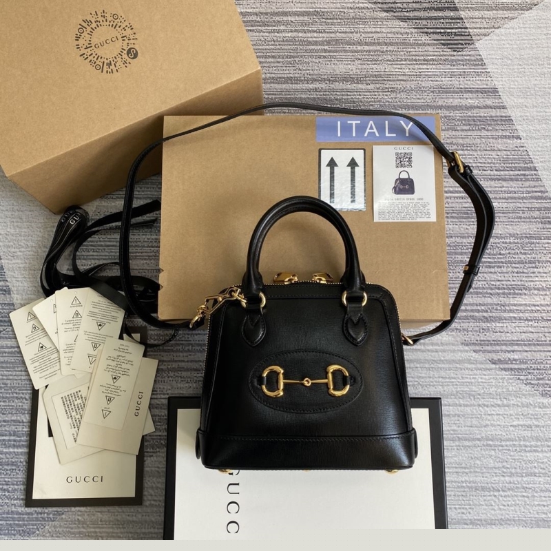 G*u*i top handle bags